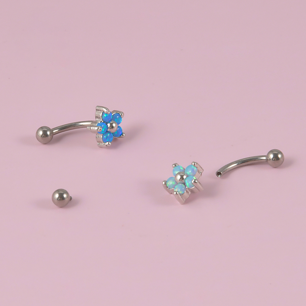 Piercing de flor de cristal de - Rook Curved Barbell reseña y precio